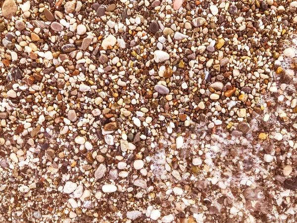Plaży Leży Wiele Kamieni Różnych Kolorach Kształtach Chodzić Skałach Tekstura — Zdjęcie stockowe