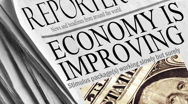 Economia sta migliorando - titoli di un giornale . — Foto Stock