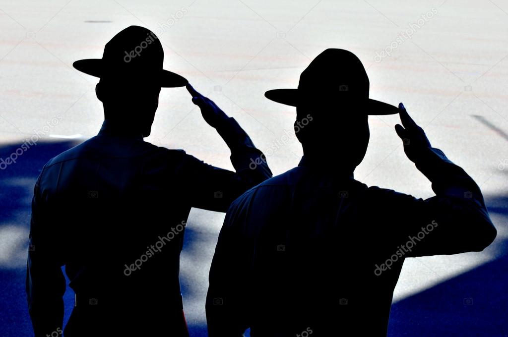 Silhouette of two Marines drill instructors