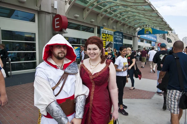 SAN DIEGO, CALIFORNIA - JULY 13: Participants Sam Cannon and Christine Rivera in costume while at Comicon in the Convention Center on July 13, 2012 in San Diego, California. — Stock Photo, Image