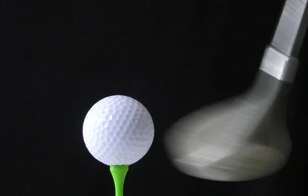 Moment of impact - black and white image of a golf club about to hit a golf ball — Stock Photo, Image