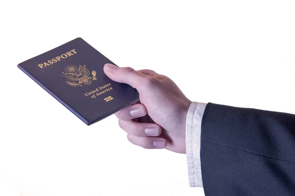Hand met ons paspoort — Stockfoto