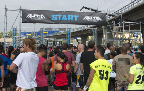 Les participants au défi de fitness Alpha Warrior Images De Stock Libres De Droits