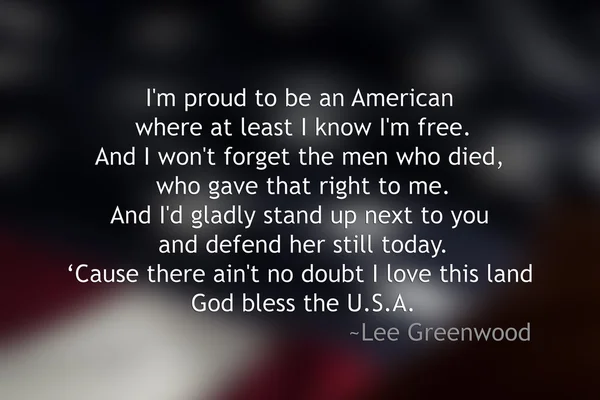 Blurred American Flag with quote in front — Stock Photo, Image