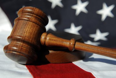 Gavel atop American flag clipart