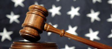 Gavel atop American flag clipart