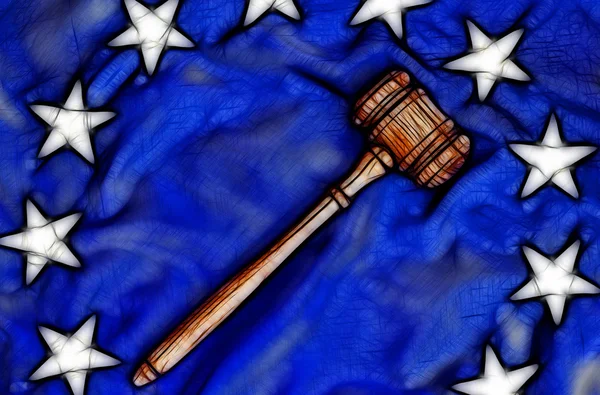 Wooden gavel atop flag — Stock Photo, Image