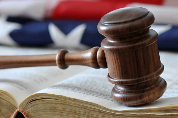 Gavel, book, and flag background. — Stock Photo, Image