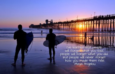 Surfers at sunset in Oceanside