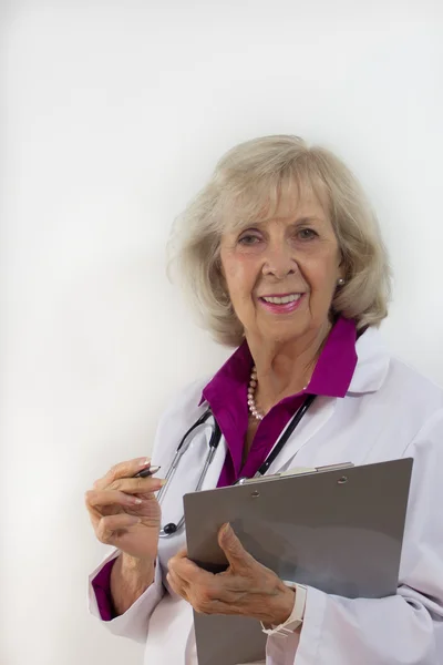 Woman Doctor Standing with a Clipboard — Stock Photo, Image