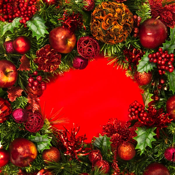 Holiday koszorú vörös-Center Stock Kép
