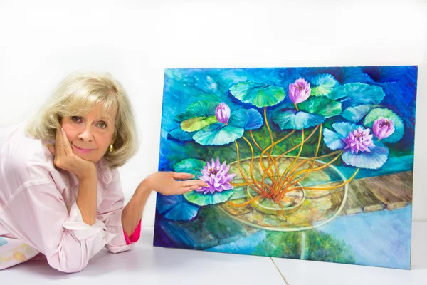 Artist Gestures to Her Finished Painting — Stock Photo, Image
