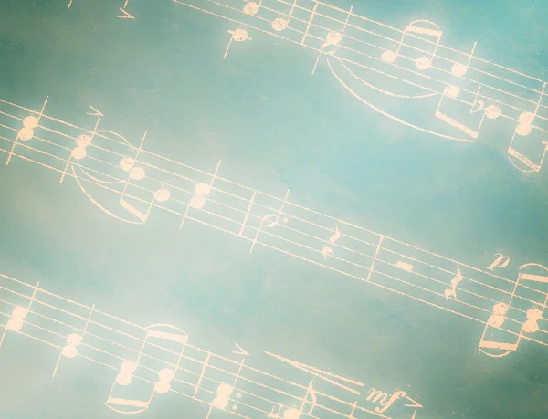 Musical notes on green — Stock Photo, Image