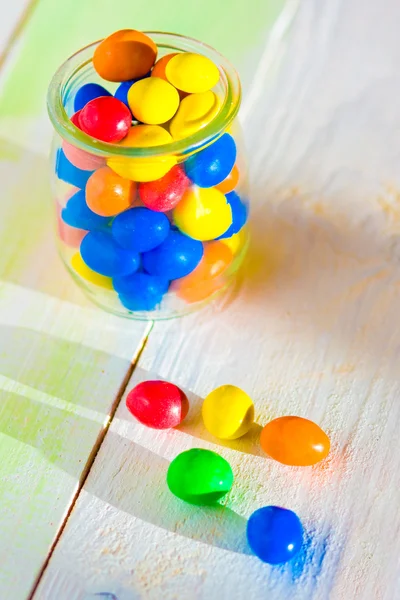 Colored candy in glass jar — Stock Photo, Image