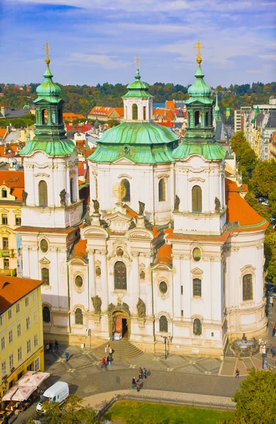 Saint Nicholas Church, Old Town Square, Prague, Czech Republic. View from Ctiy Hall in autumn — Stock Photo, Image