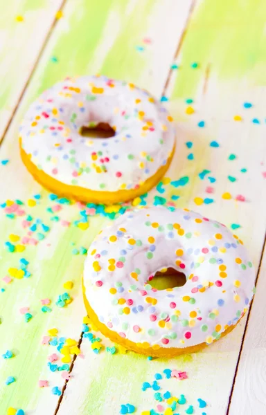 Baked donuts on wood — Stock Photo, Image