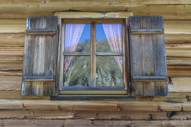 Window of a typical mountain hut in Italy, Europe