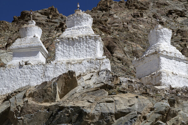 Old stupas in the mountains of Ladakh, India