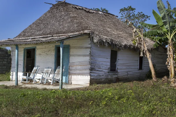 Small residential home on Cuba with rocking chairs — Stock Photo, Image