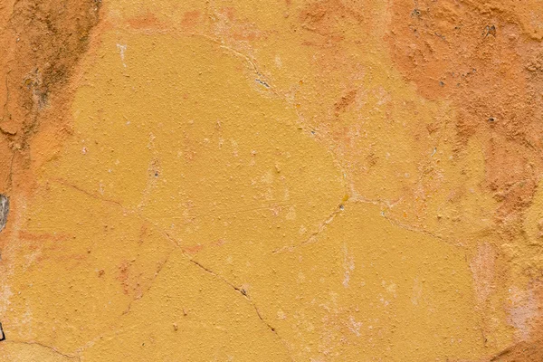 Погодные оранжевые стены в качестве фона — стоковое фото