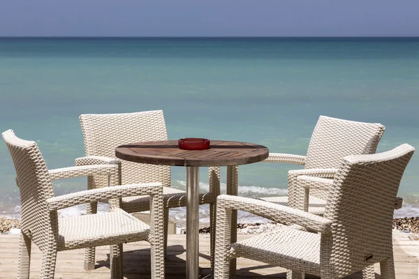 Table and chairs in Greece — Stock Photo, Image