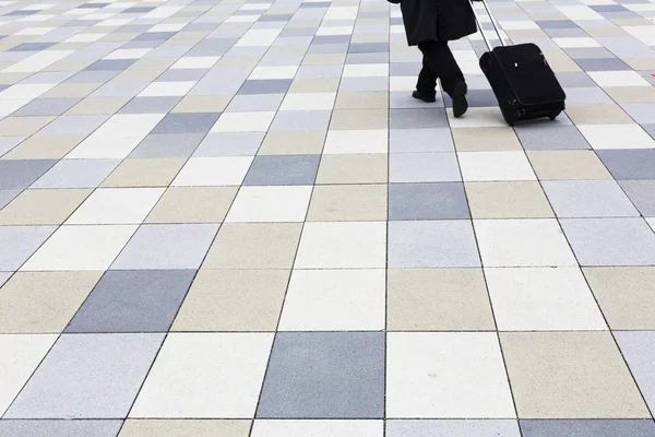 Businessman walking with travel bag — Stock Photo, Image