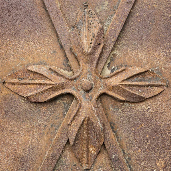 Rusty iro plate with rosette as background — Stock Photo, Image