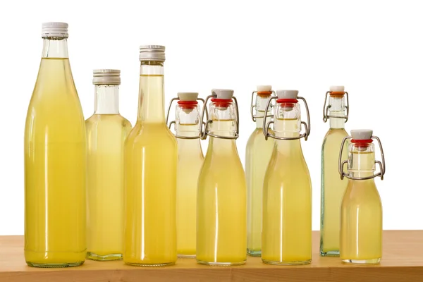 Bottles filled with elderflower syrup — Stockfoto