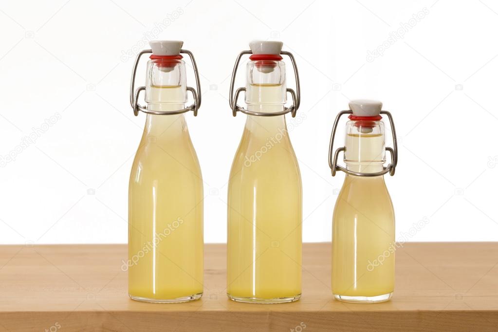 Bottles filled with elderflower syrup