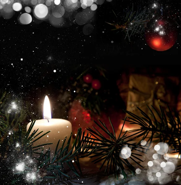 Christmas still life with snow candles and christmas decorations — Stock Photo, Image