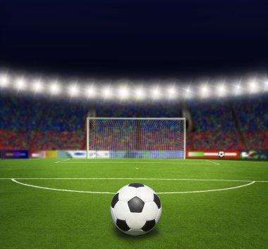 Yeşil futbol sahası, parlak spot ışıkları,