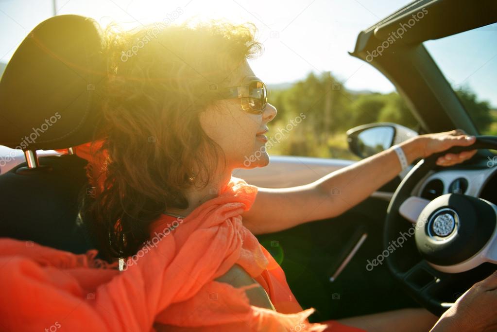 Woman in the car.