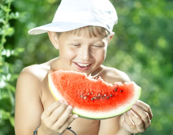 Boy and watermelon — Stock Photo, Image