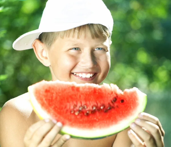 Boy and watermelon — Stock Photo, Image