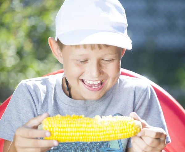 Boy with corn — Stock Photo, Image