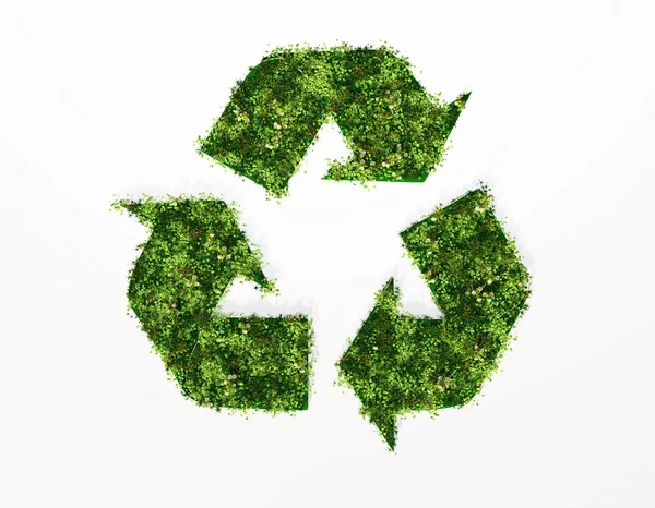 Recycling symbol covered by grass and flowers — Stock Photo, Image