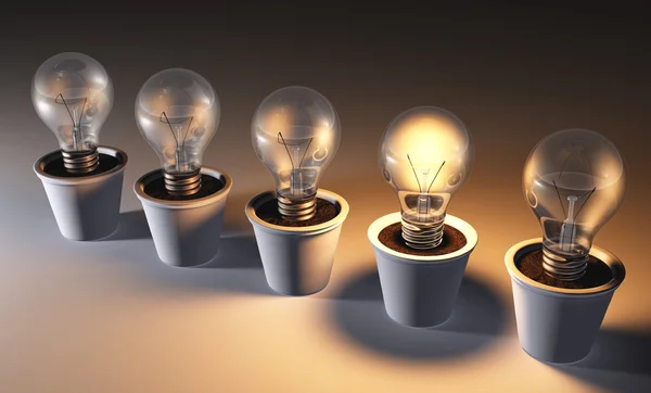 Row of light bulbs in pots — Stock Photo, Image