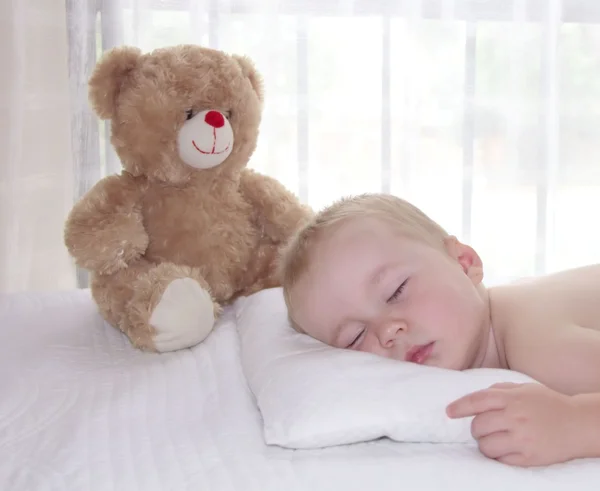 Toddler boy is sleeping on the pillow Stock Photo