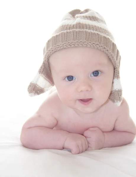 Adorable baby in knitted hat isolated on white background — Stock Photo, Image