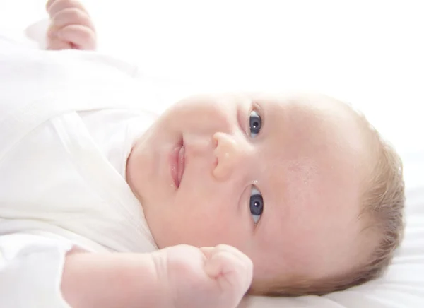 Schattige baby lacht Stockfoto