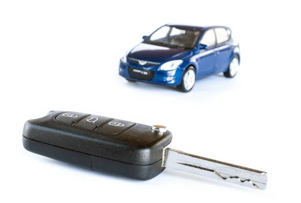 Key & car isolated on the white background — Stock Photo, Image