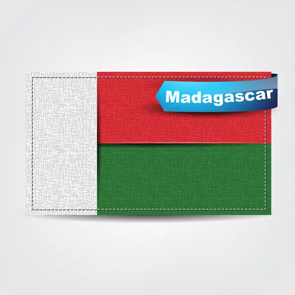 Texture tissu du drapeau de Madagascar — Image vectorielle