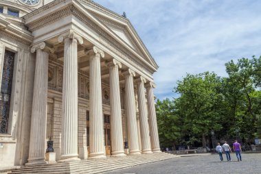 BUCHAREST, ROMANIA - MAY 09: The Romanian Athenaeum on May 09, 2013 in Bucharest, Romania. Opened in 1888 it is a concert hall in the center of Bucharest and a landmark of the Romanian capital city. clipart