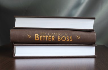 Becoming a better boss. Book concept. clipart