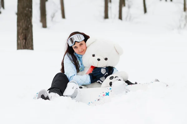 Young woman with snowboard — Stock Photo, Image