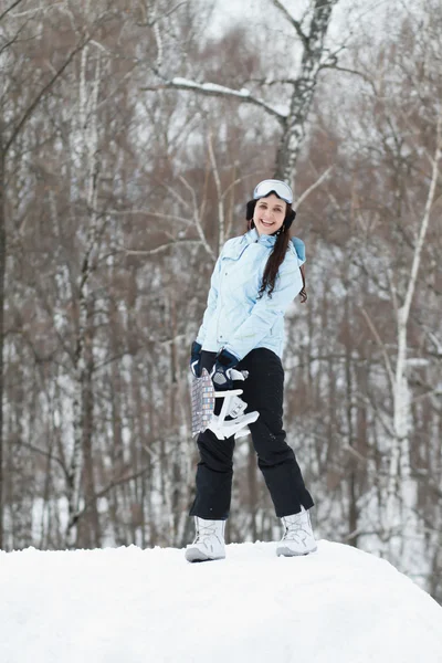 Genç kadın snowboard — Stok fotoğraf