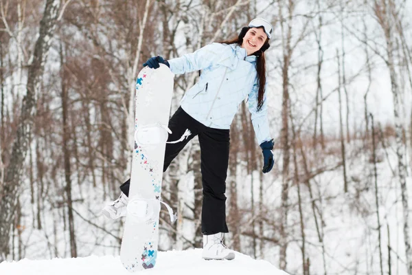 Genç kadın snowboard — Stok fotoğraf