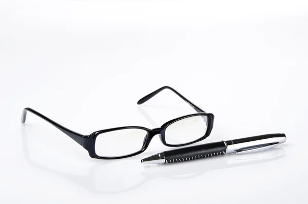 Stift und Brille — Stockfoto