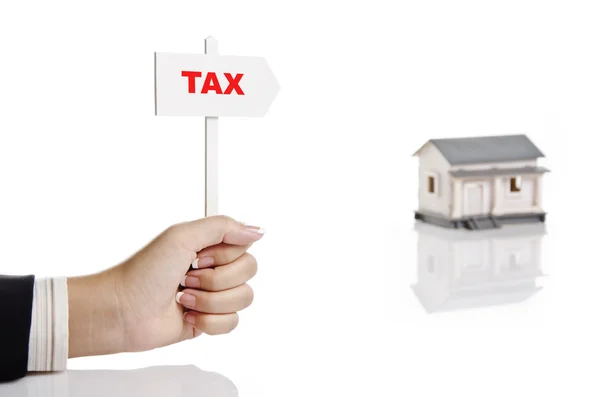 Holding tax sign — Stock Photo, Image