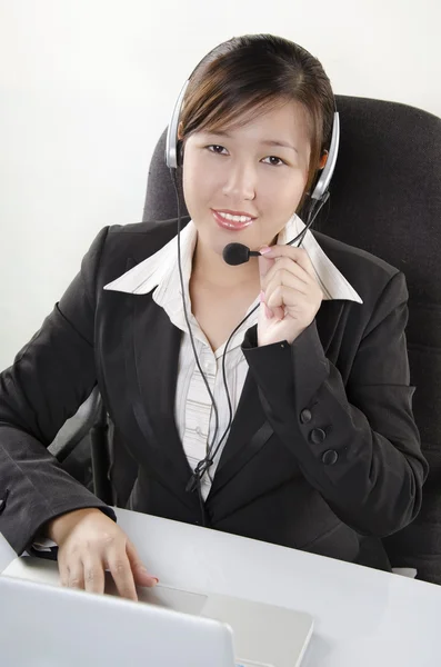 Beautiful customer service agent in call center — Stock Photo, Image